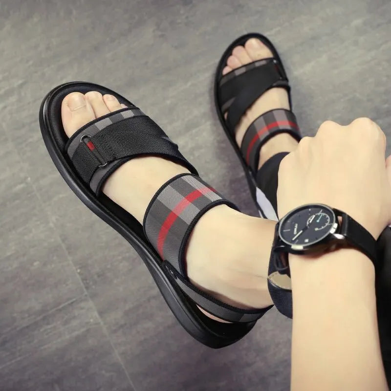 Youth leisure sports sandals with Lycra upper and polyurethane sole on size chart.