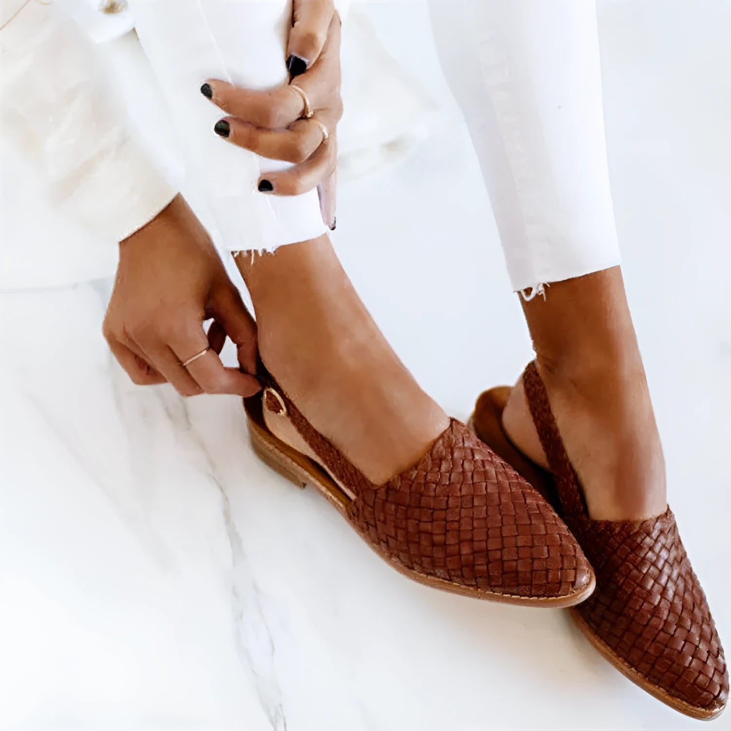 Women's flat buckle sandals with pointed toe in multiple colour options on a white background