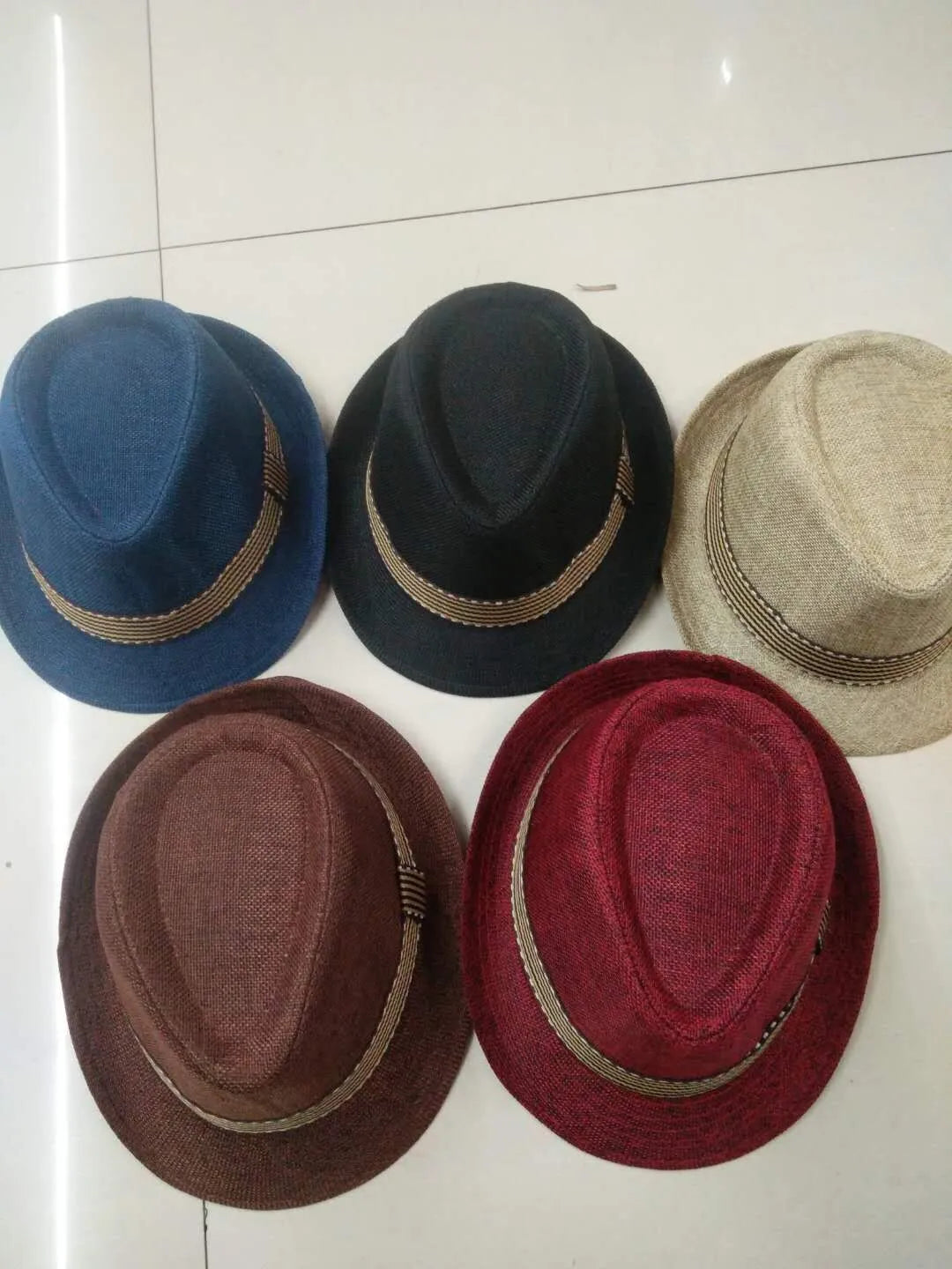 Monochrome sun hat in warp knit with satin finish, available in seven colours, one size fits all for spring and summer