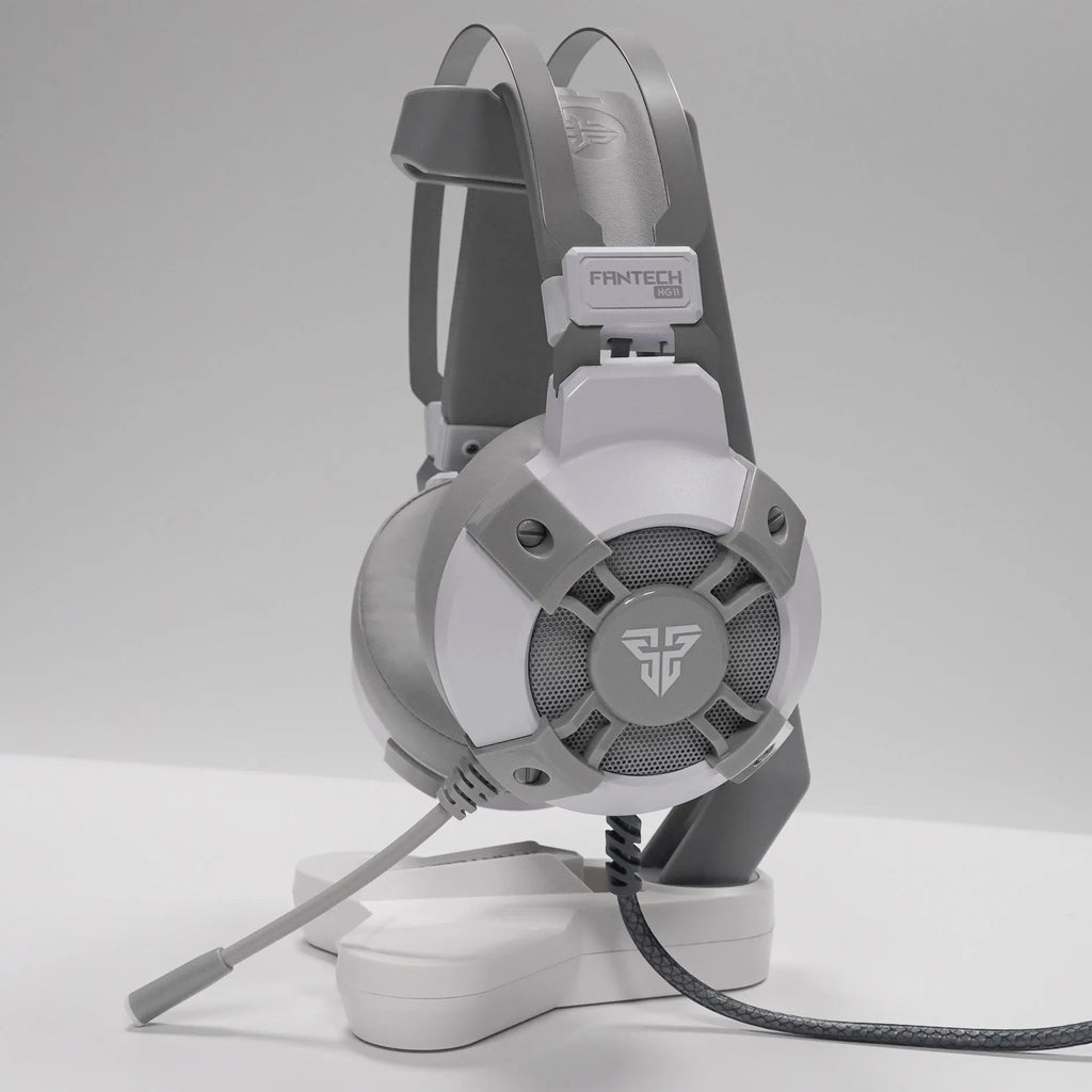 Black FANTECH HG11 USB gaming headset with RGB lights and an inline remote control on the cable.
