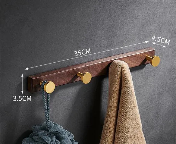 Black walnut style aluminum clothes hooks with brass finish in a row, showing 3, 4, 5, and 6-hook style options.