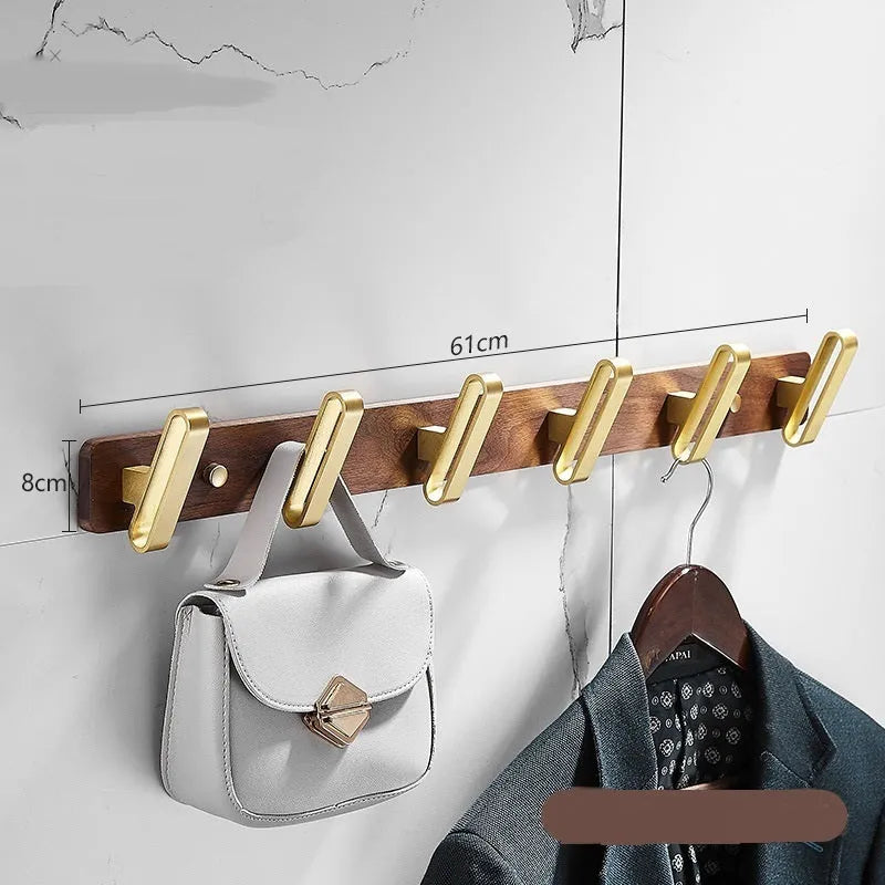 Black walnut style aluminum clothes hooks with brass finish in a row, showing 3, 4, 5, and 6-hook style options.