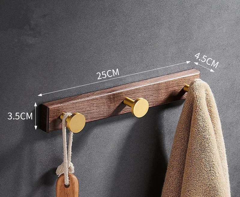 Black walnut style aluminum clothes hooks with brass finish in a row, showing 3, 4, 5, and 6-hook style options.