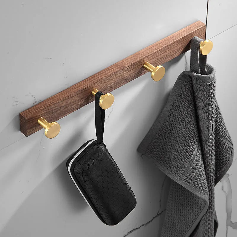 Black walnut style aluminum clothes hooks with brass finish in a row, showing 3, 4, 5, and 6-hook style options.