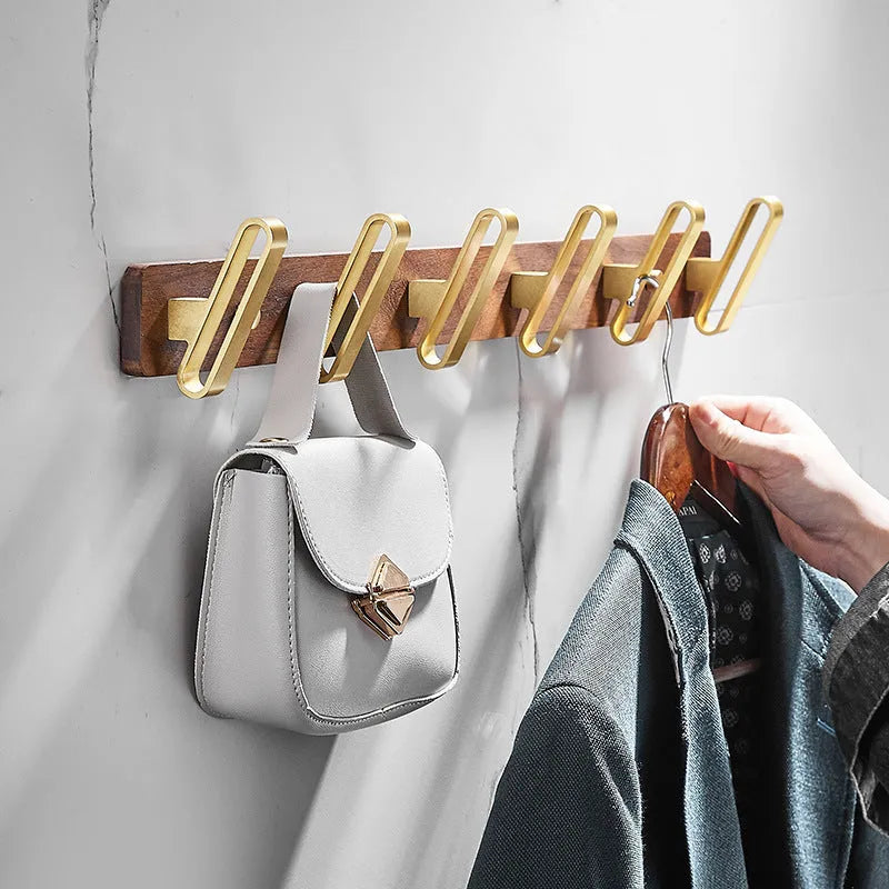 Black walnut style aluminum clothes hooks with brass finish in a row, showing 3, 4, 5, and 6-hook style options.