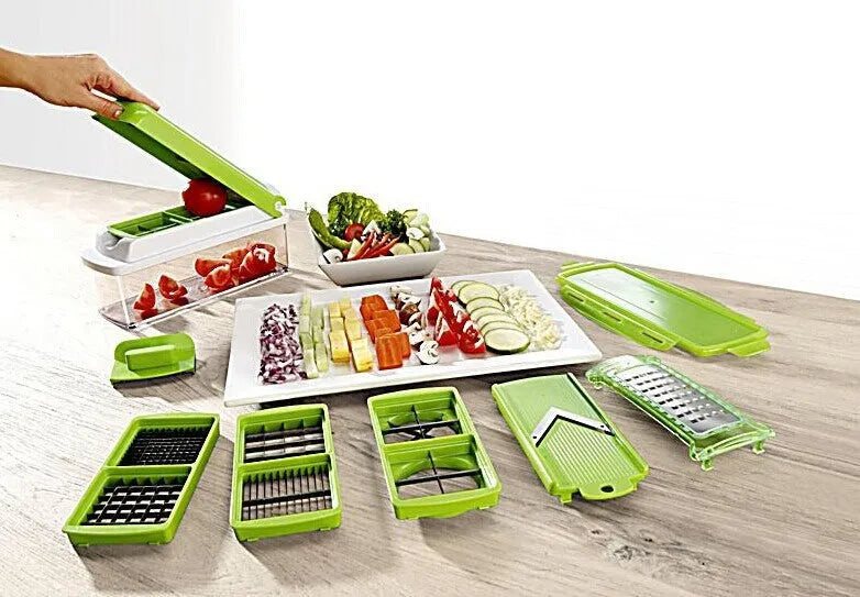 Green 12-piece manual vegetable chopper set with stainless steel blades on a kitchen counter.