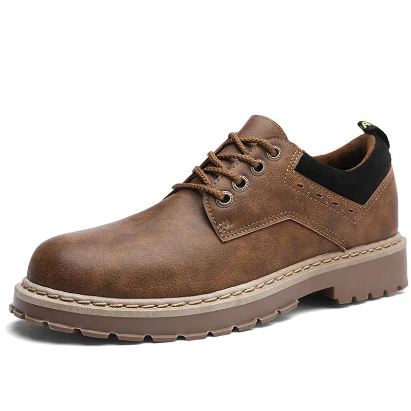 Men's black casual shoes with lace-up front and round toe design on rubber sole