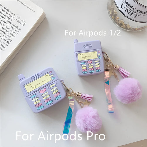 Purple silicone case for Apple AirPods with clamshell closure and fur ball pendant