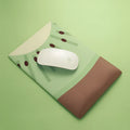 Green kiwi-shaped mouse pad with wrist support cushion measuring 270mm by 180mm