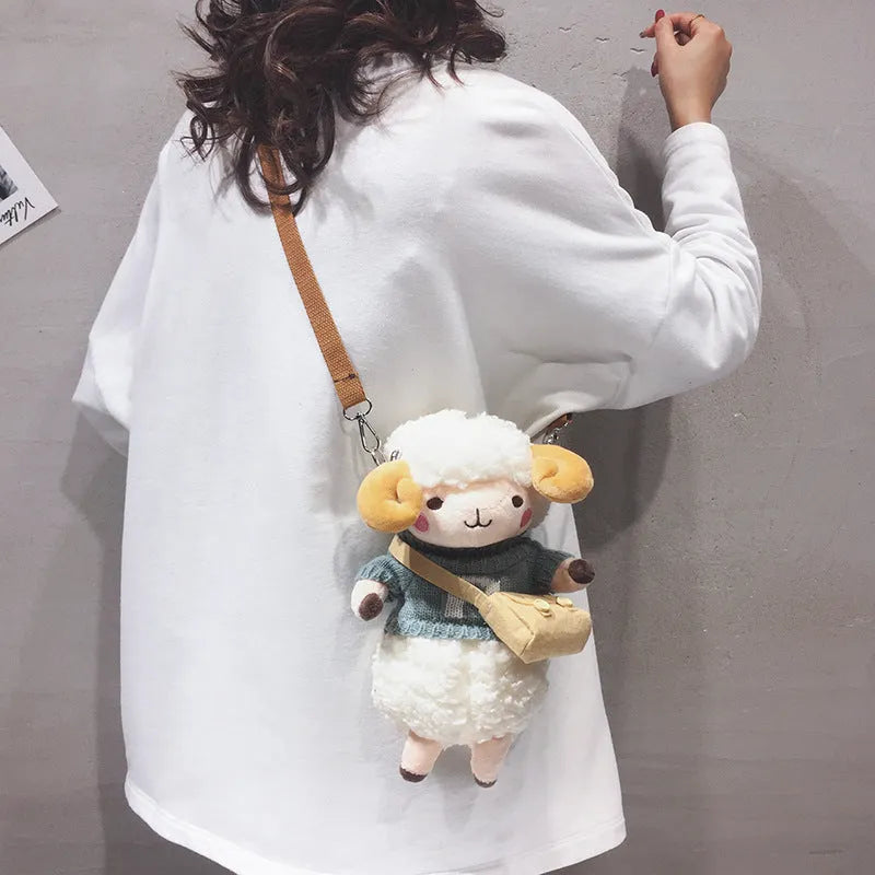 Small square crossbody bag in plush fabric with lamb pattern design and zip closure