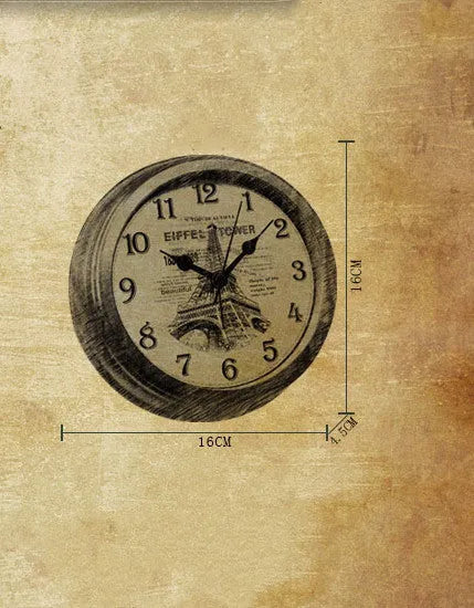 Round retro European desk clock with a 6-inch dial on a wooden surface.