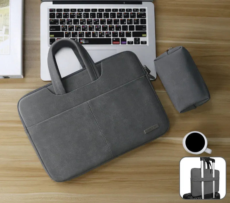 Blue waterproof PU leather laptop bag open, showing internal organiser pockets and shock-resistant computer compartment.