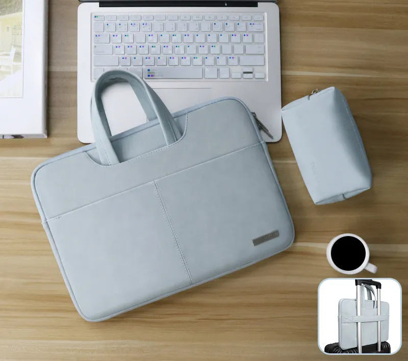 Blue waterproof PU leather laptop bag open, showing internal organiser pockets and shock-resistant computer compartment.