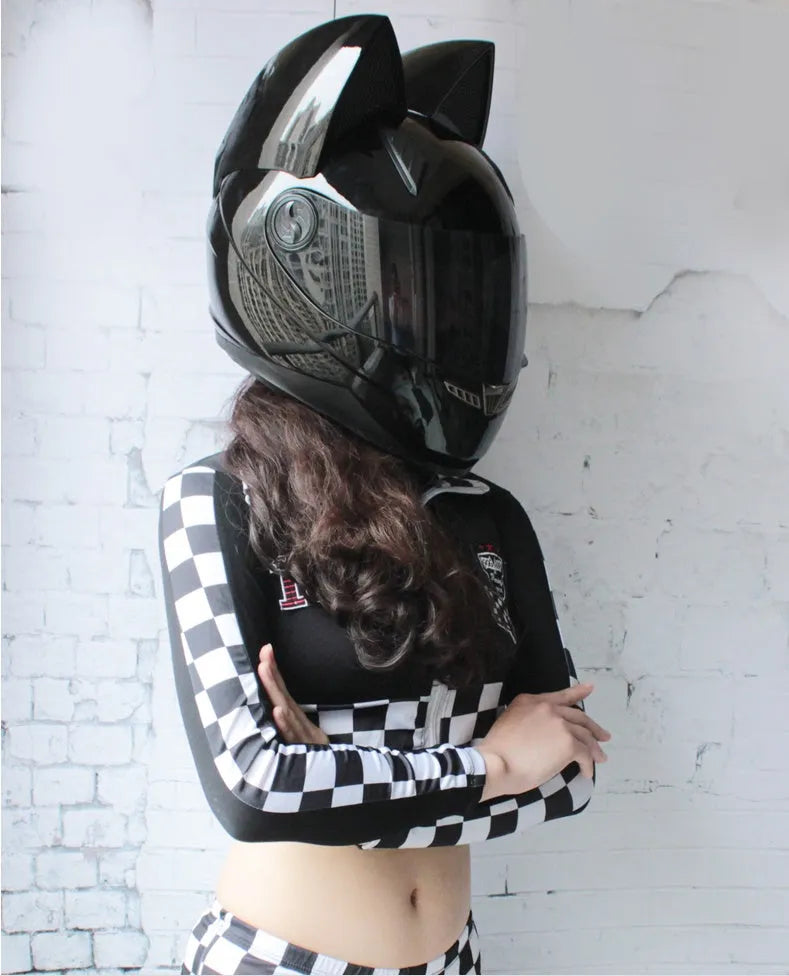 Full face motorcycle helmet with cat ears and headless rider design in black ABS