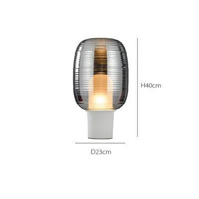 Simple modern glass table lamp in Cognac colour with a push-button switch and LED light