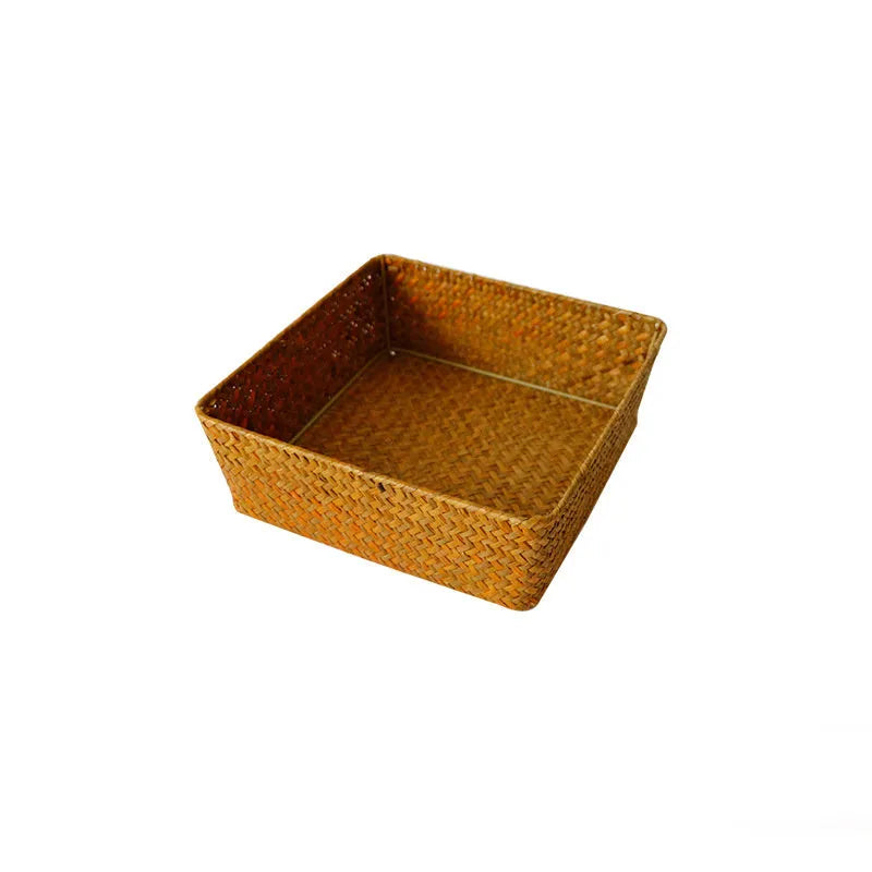 Natural straw rectangular storage box for desk organisation, shown in brown colour.