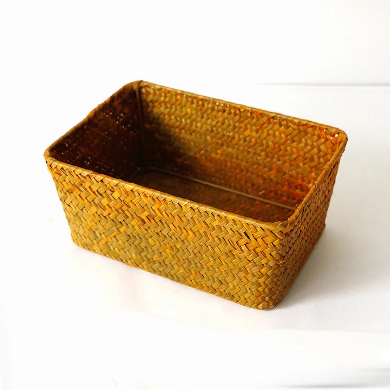 Natural straw rectangular storage box for desk organisation, shown in brown colour.