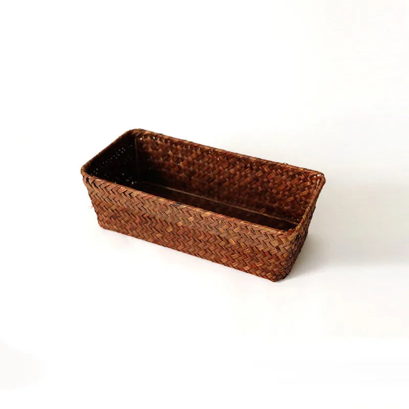 Natural straw rectangular storage box for desk organisation, shown in brown colour.