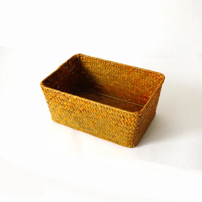 Natural straw rectangular storage box for desk organisation, shown in brown colour.