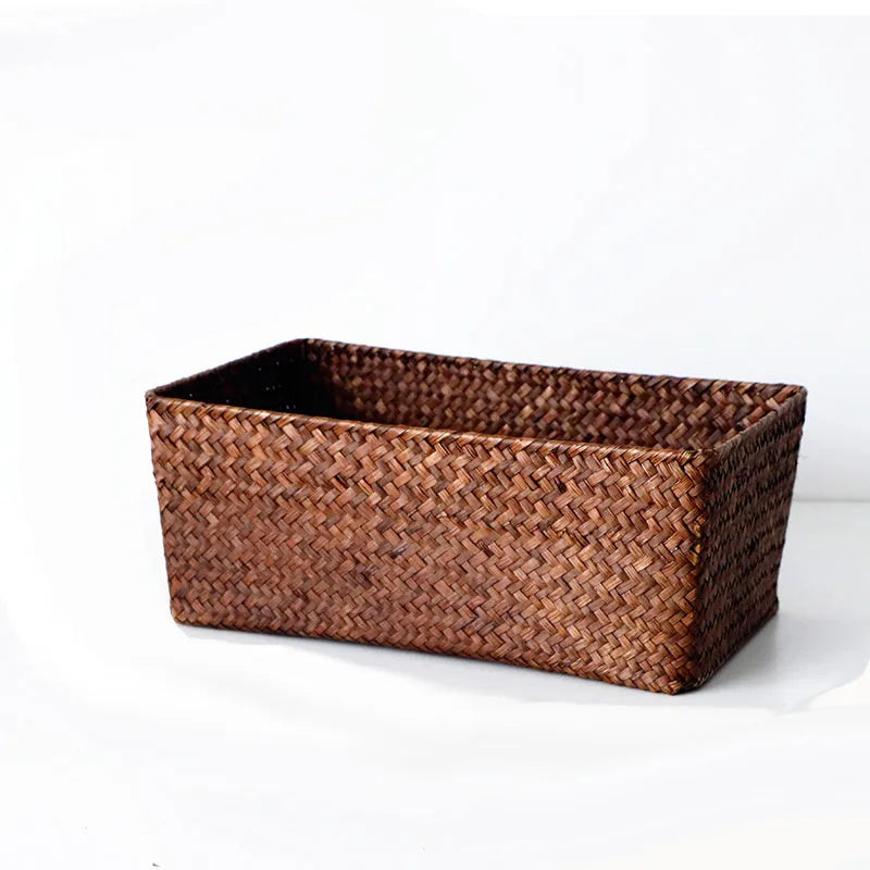 Natural straw rectangular storage box for desk organisation, shown in brown colour.