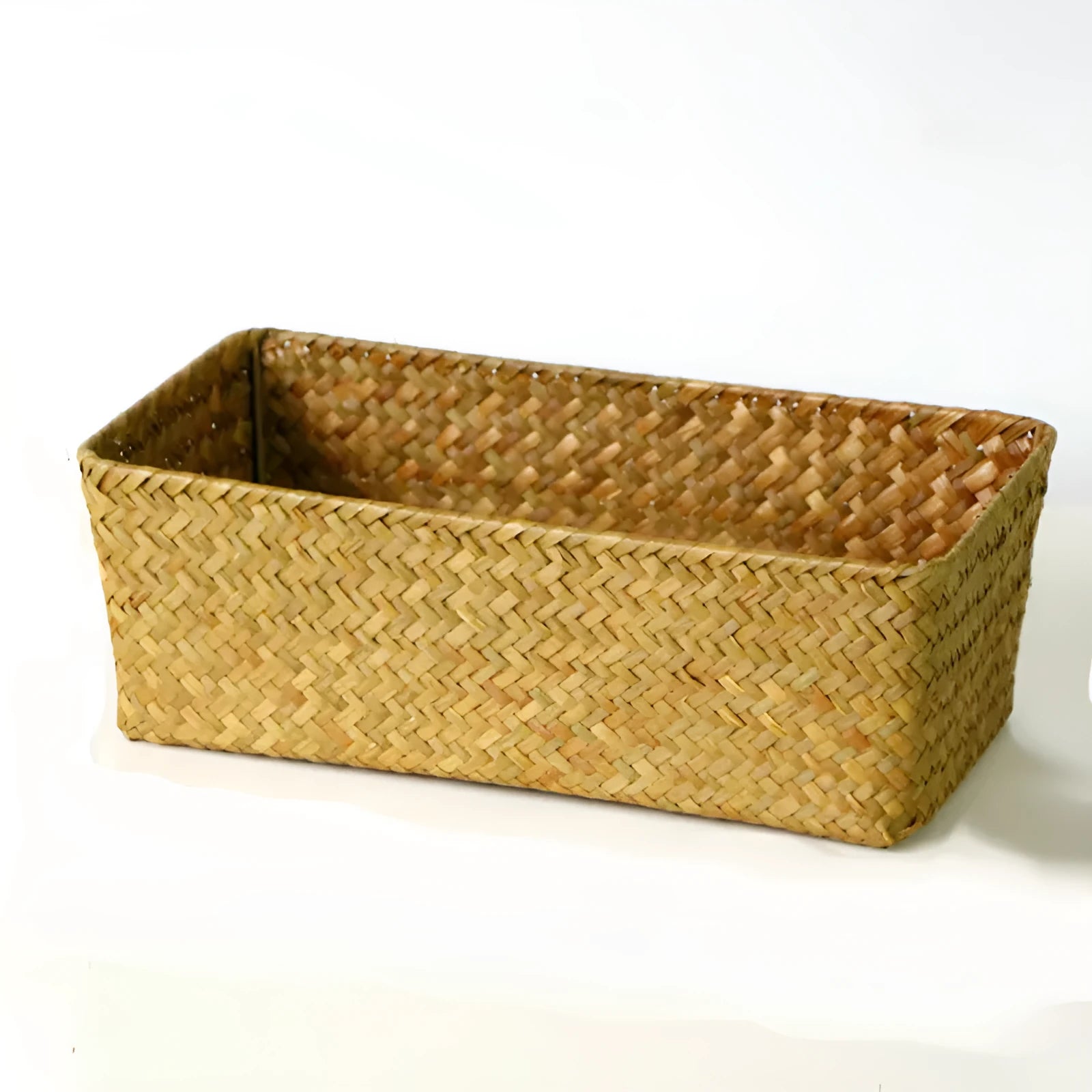 Natural straw rectangular storage box for desk organisation, shown in brown colour.