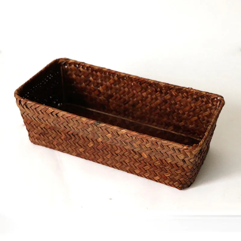 Natural straw rectangular storage box for desk organisation, shown in brown colour.