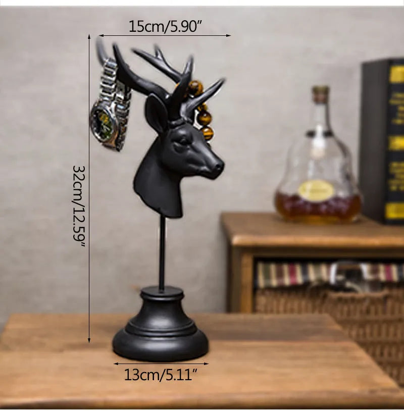 Tall black natural resin animal sculpture decoration on a wooden shelf.