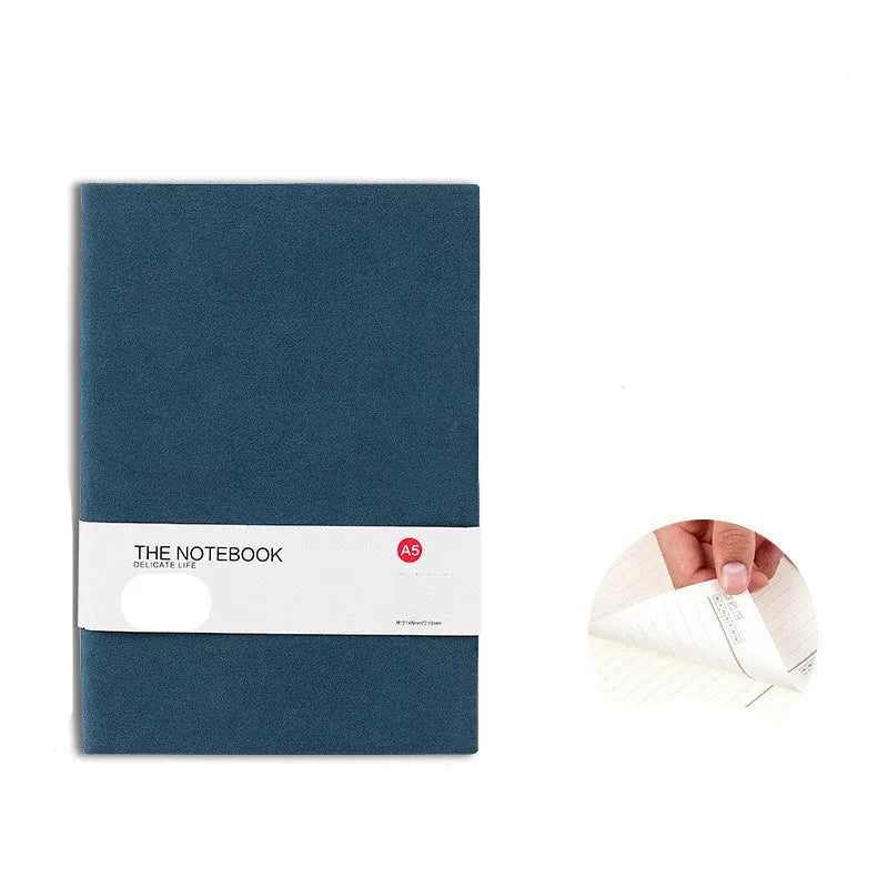 Simple solid-colour notebook with thickened pages in green, dark blue, or orange red, shown in A5 size.