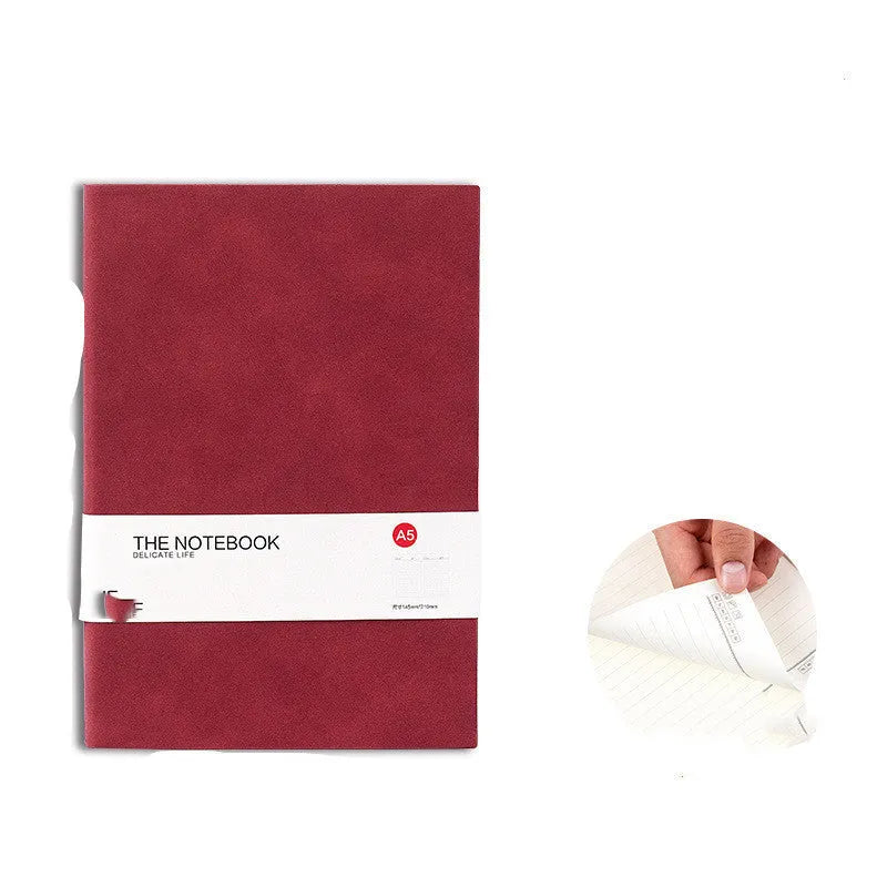 Simple solid-colour notebook with thickened pages in green, dark blue, or orange red, shown in A5 size.