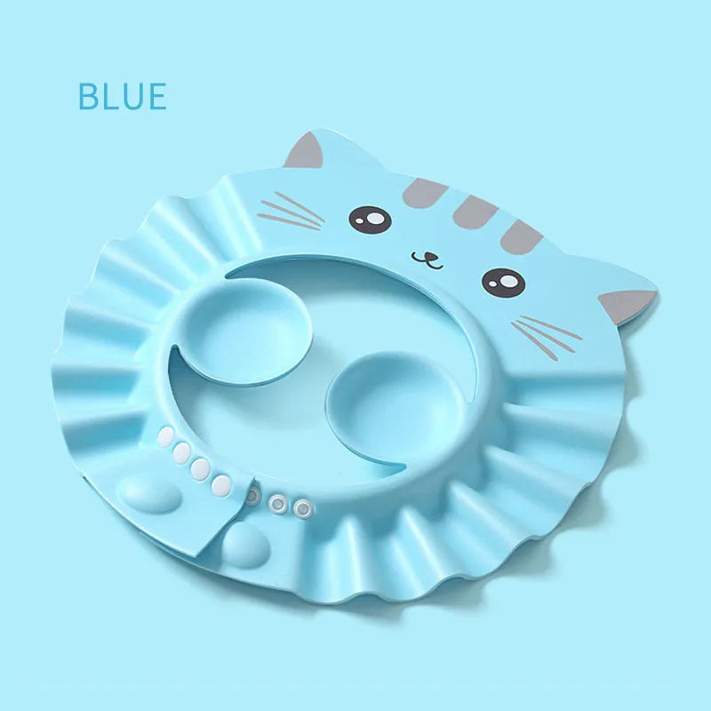 Waterproof adjustable baby shower cap with ear protection in blue, showing cartoon pattern