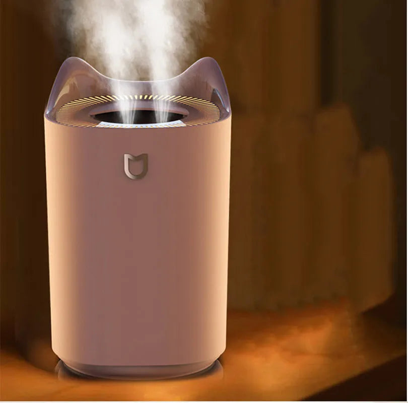 Double spray humidifier with three mist outlets and USB port in Coral Pink or Glacier White colour.