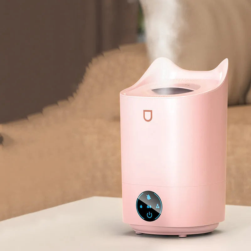 Double spray humidifier with three mist outlets and USB port in Coral Pink or Glacier White colour.