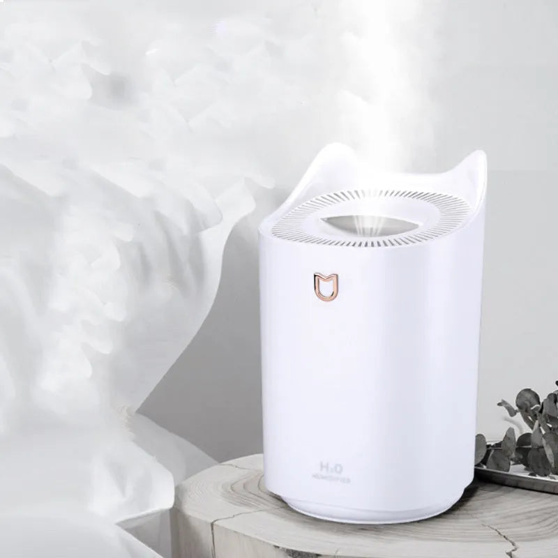 Double spray humidifier with three mist outlets and USB port in Coral Pink or Glacier White colour.