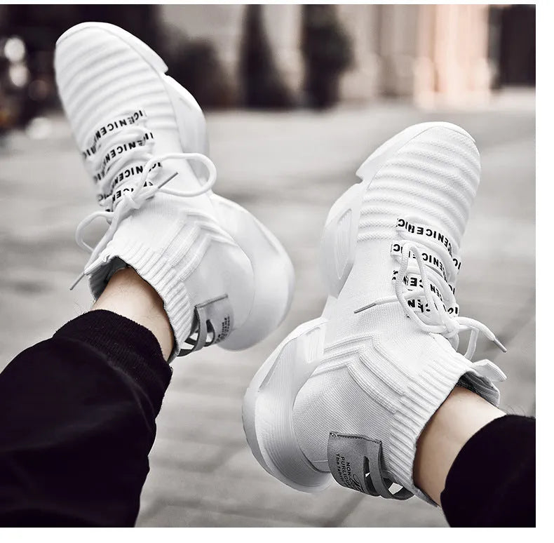 Men's black and white casual sports shoes with mesh lining available in sizes EU 39 to 47