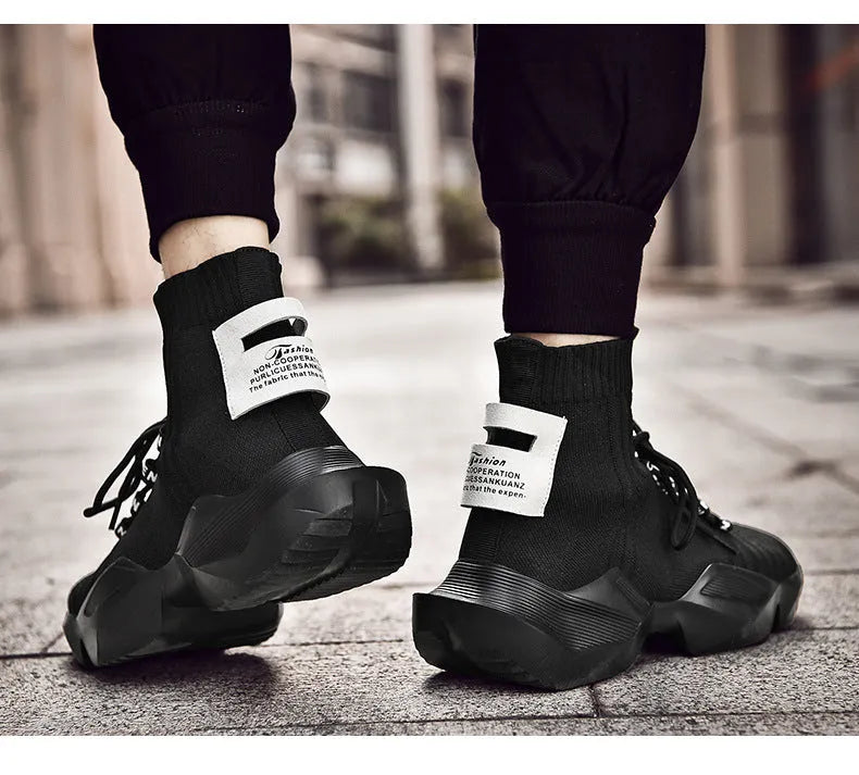 Men's black and white casual sports shoes with mesh lining available in sizes EU 39 to 47