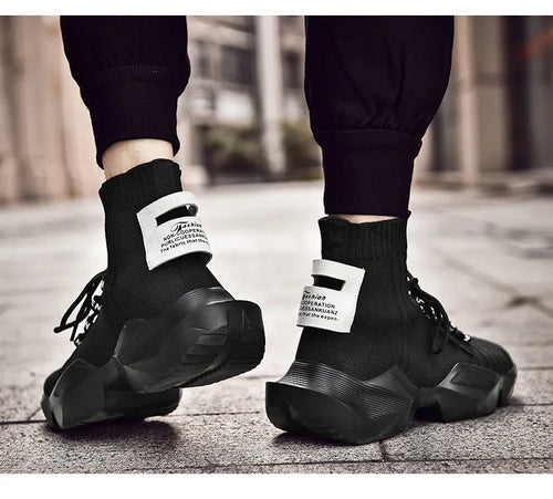 Men's black and white casual sports shoes with mesh lining available in sizes EU 39 to 47
