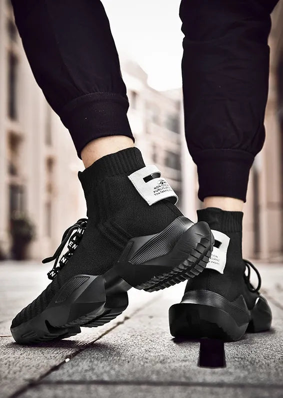 Men's black and white casual sports shoes with mesh lining available in sizes EU 39 to 47