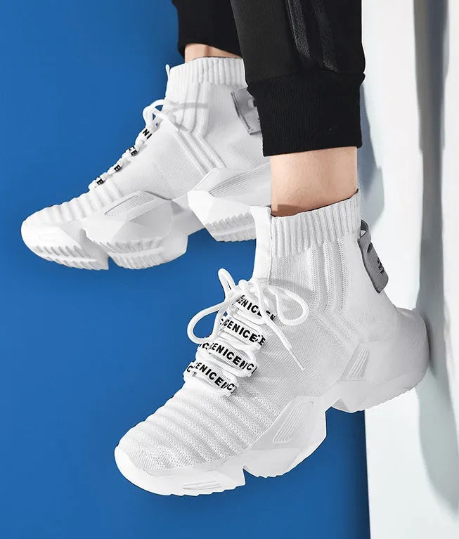 Men's black and white casual sports shoes with mesh lining available in sizes EU 39 to 47
