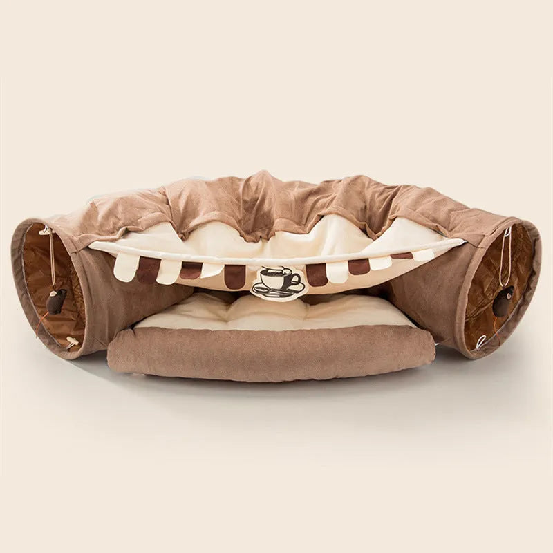 Collapsible cloth cat tunnel for play, shown in one of four colours: Bar, Coffee, Matcha, or Pink.