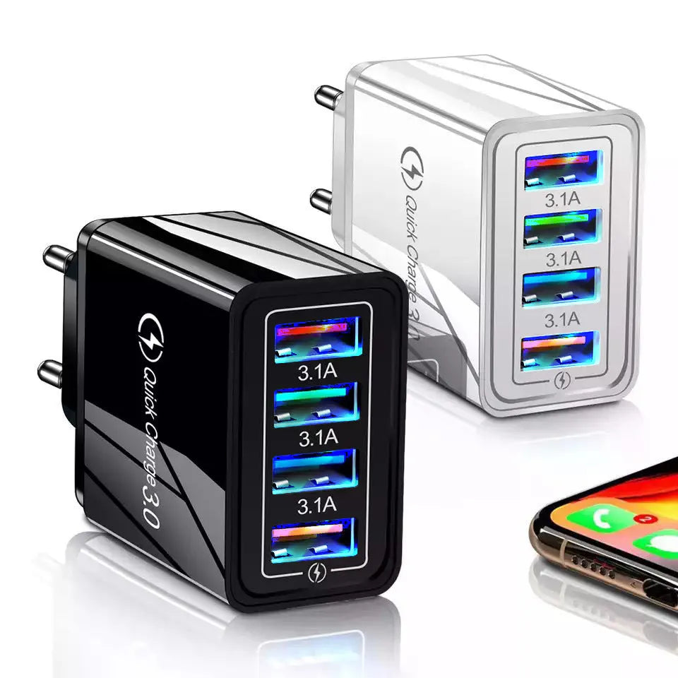 Dark blue 4-port USB wall charger with EU plug next to mobile phone