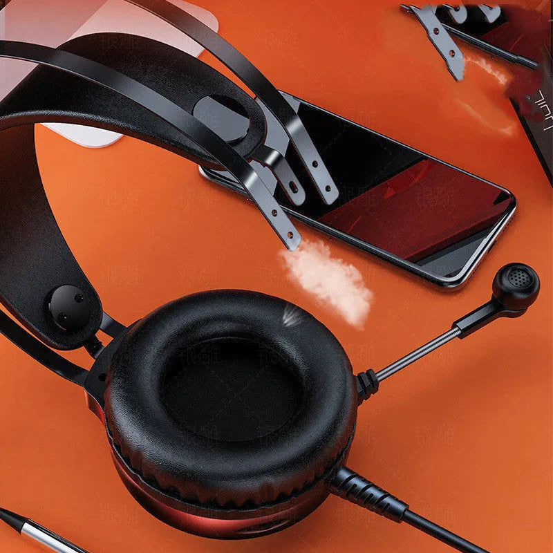 Black wired computer headset with microphone and protein earmuffs showing 3.5mm plug