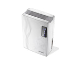 White compact household dehumidifier with 2.2L water tank and electronic control panel