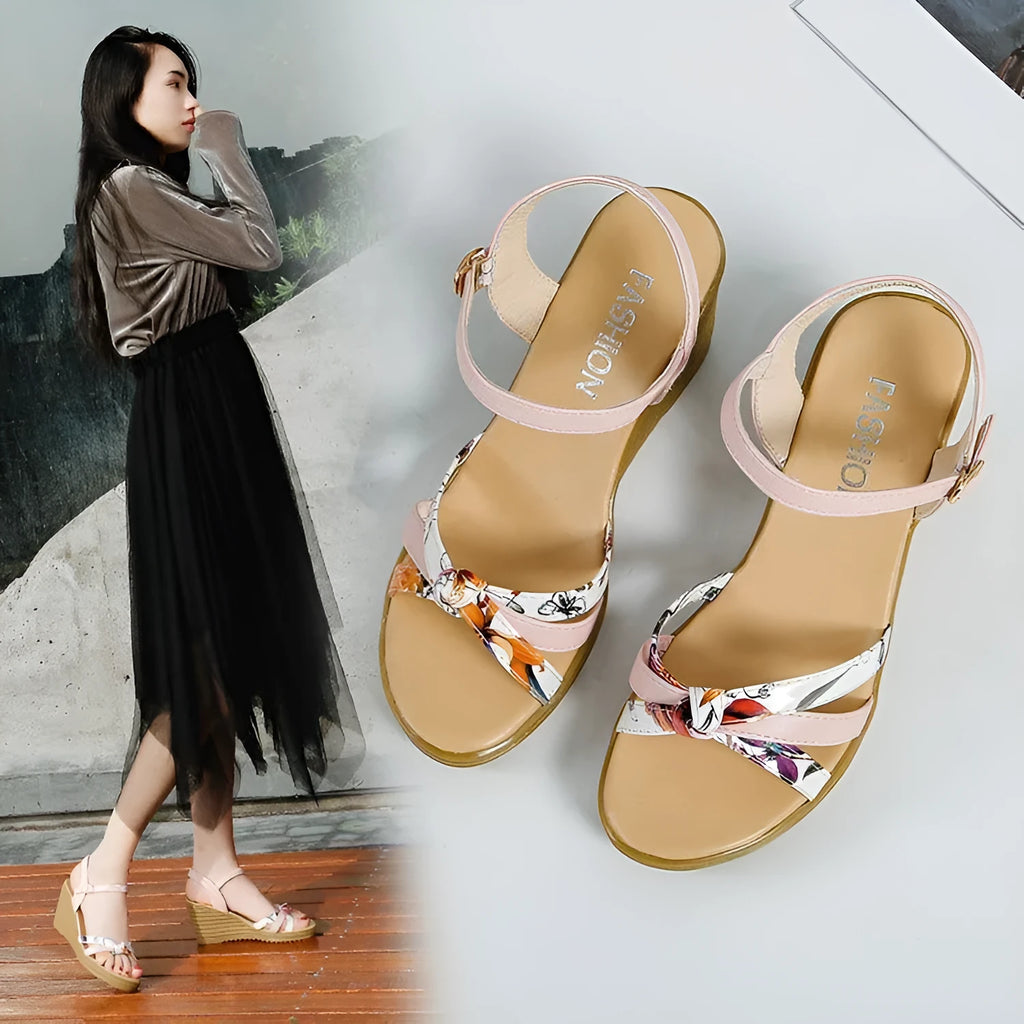 Women's pink wedge sandals with a buckle closure and thick non-slip heel