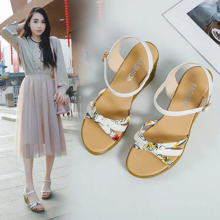 Women's pink wedge sandals with a buckle closure and thick non-slip heel