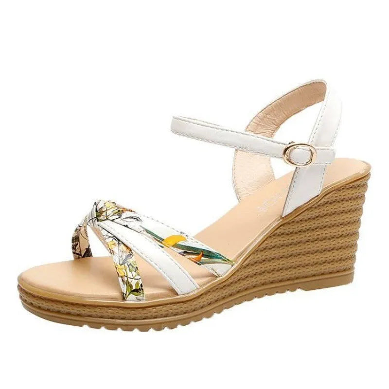 Women's pink wedge sandals with a buckle closure and thick non-slip heel