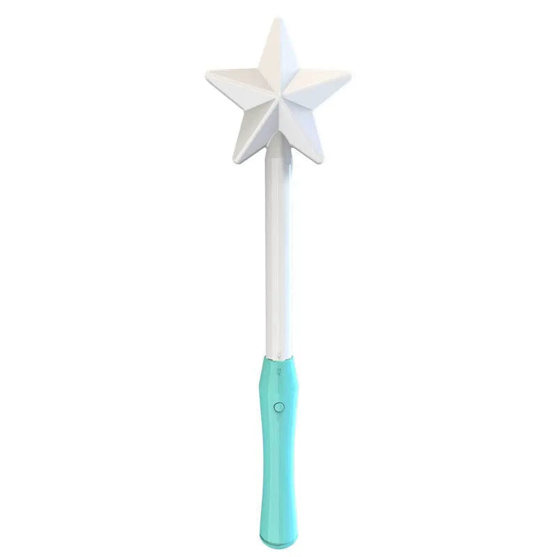 Blue flying ball toy with LED lights hovering above a child's hand next to a magic wand.