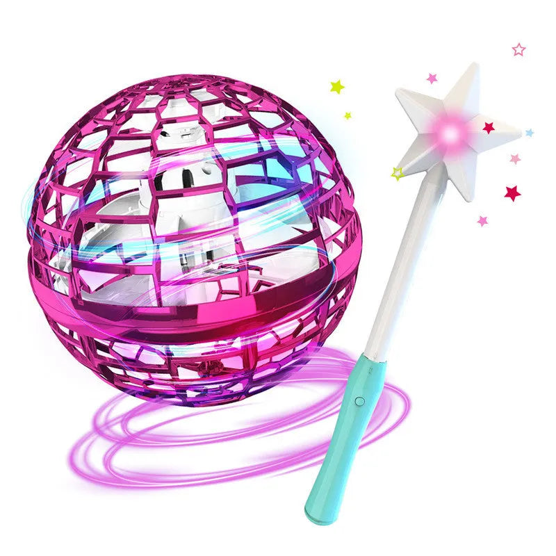 Blue flying ball toy with LED lights hovering above a child's hand next to a magic wand.