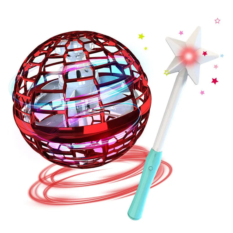 Blue flying ball toy with LED lights hovering above a child's hand next to a magic wand.