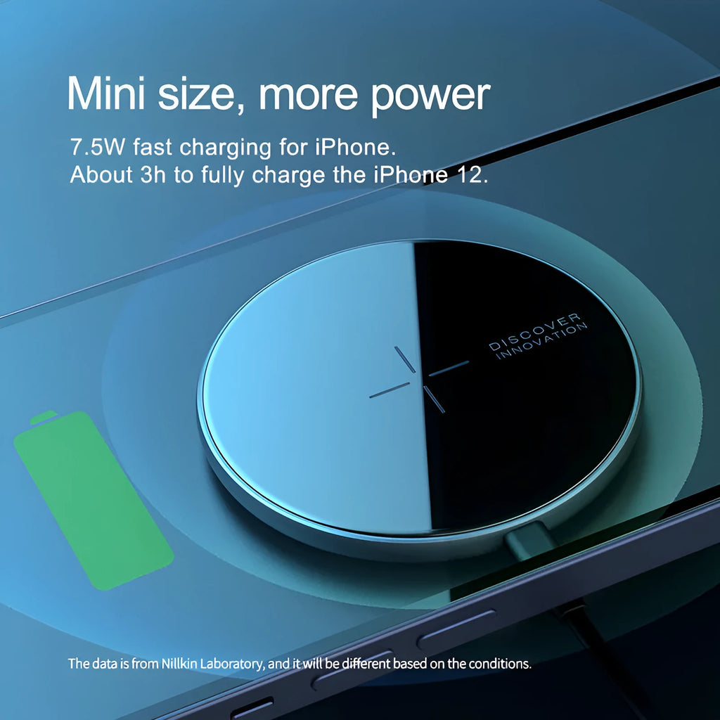 Black MagSlim magnetic wireless phone charger with foldable aluminium stand on a desk