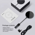 Black MagSlim magnetic wireless phone charger with foldable aluminium stand on a desk